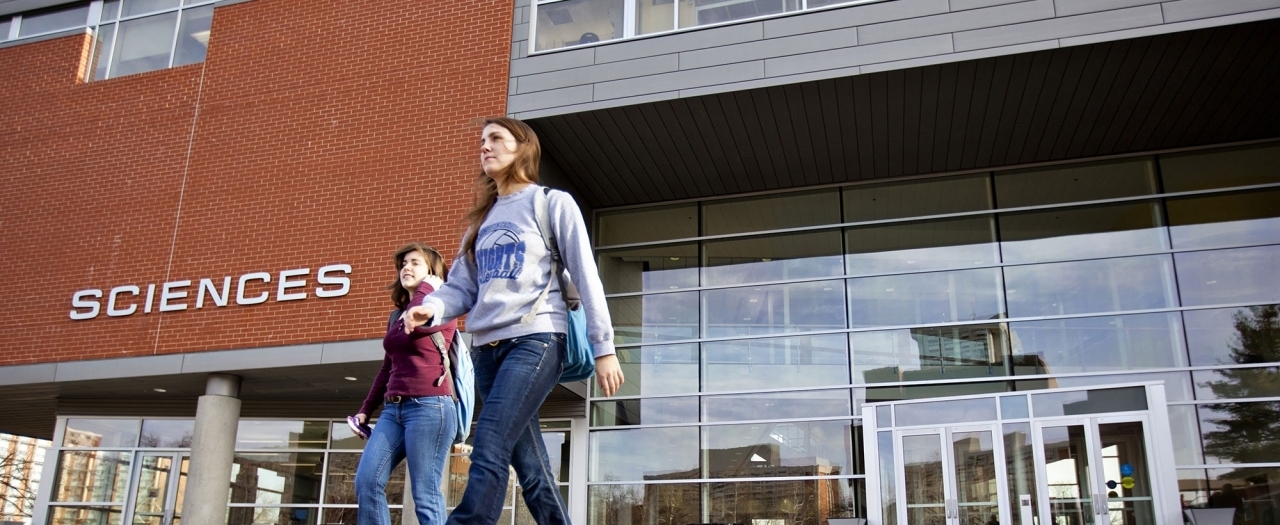 EKU Students walking in front of the New Science Building. 