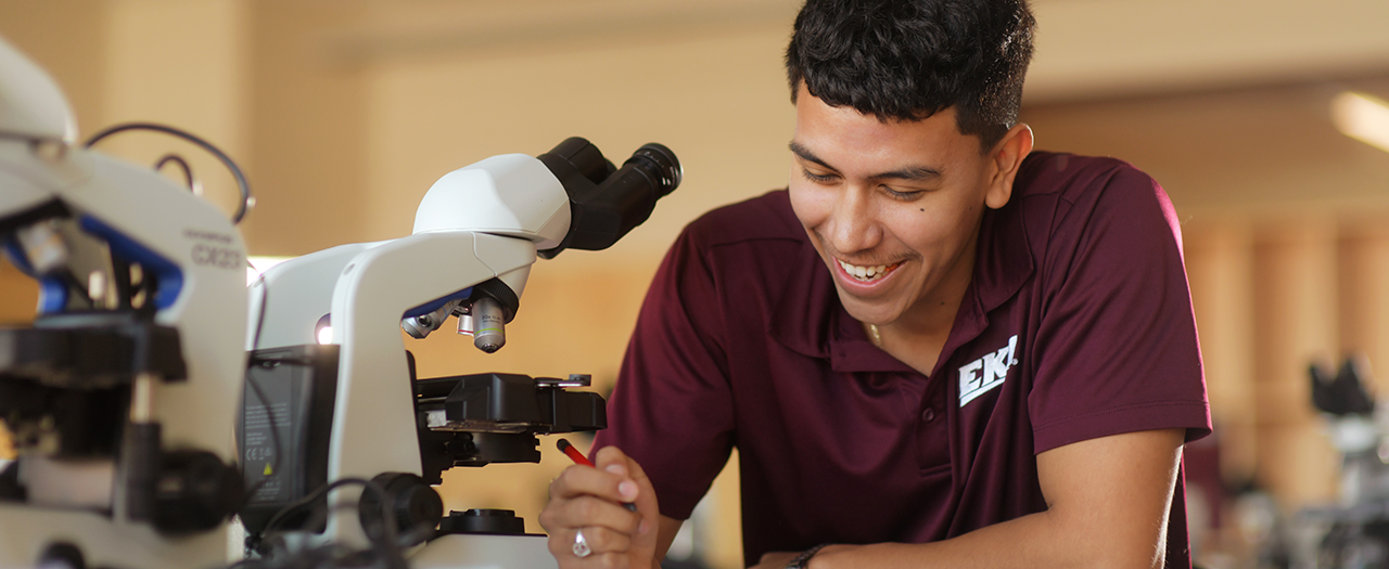 EKU student using lab equipment