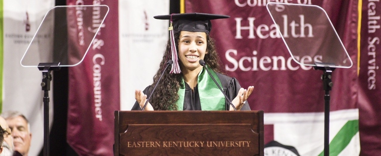 Marcella Rocha speaks at graduation. 