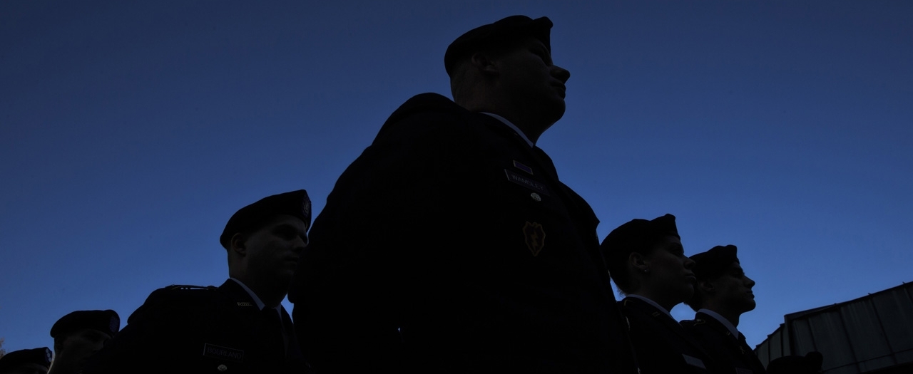 file photo of veterans in silhouette
